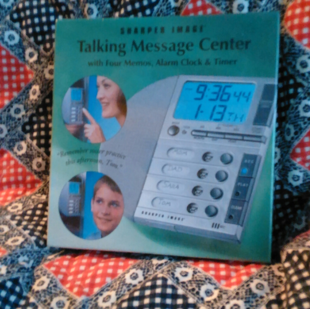 NEW IN BOX, SHARPER IMAGE TALKING MESSAGE CENTER.